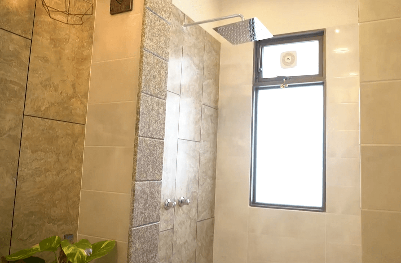 Bathroom vanity and tiled wall detail