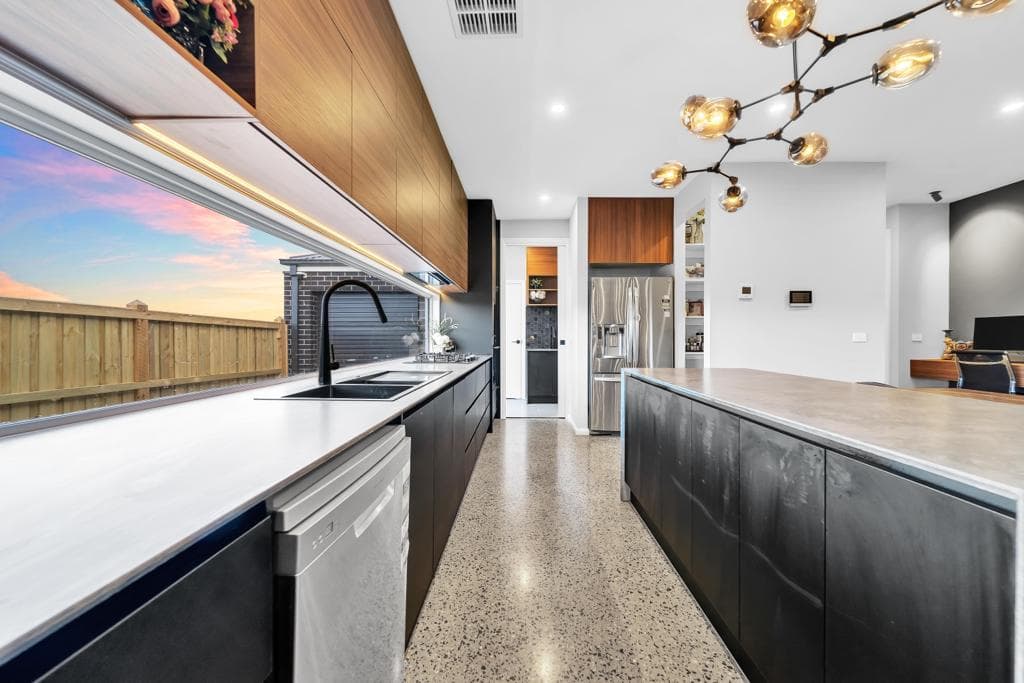 Modern kitchen with timber and white cabinetry