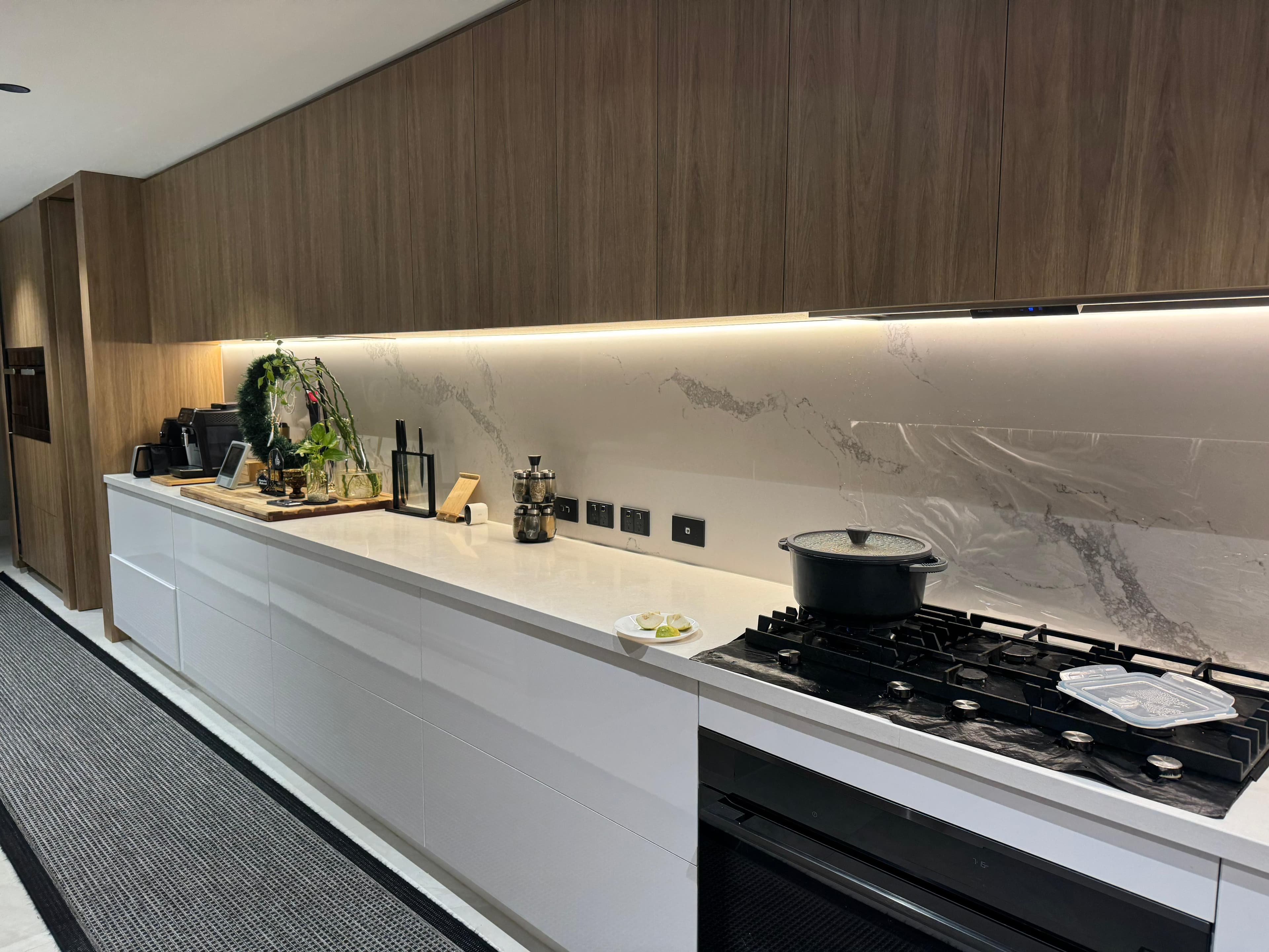 Custom kitchen in Southern River with timber flooring and pendant lighting